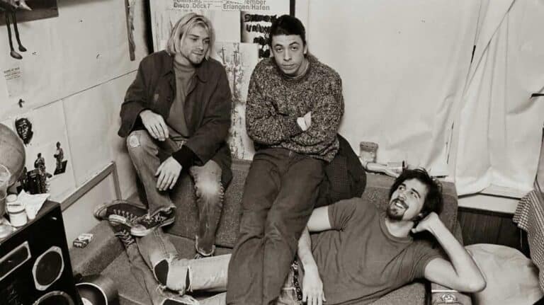Converse advertisement of Nirvana wearing all star Chuck Taylor shoes.